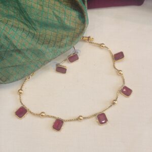 red stone and ball necklace